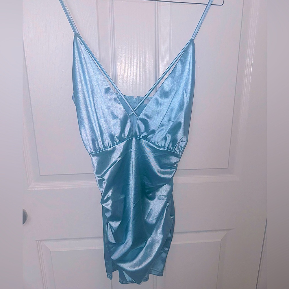 shimmery mini light blue strappy dress in silky satin material